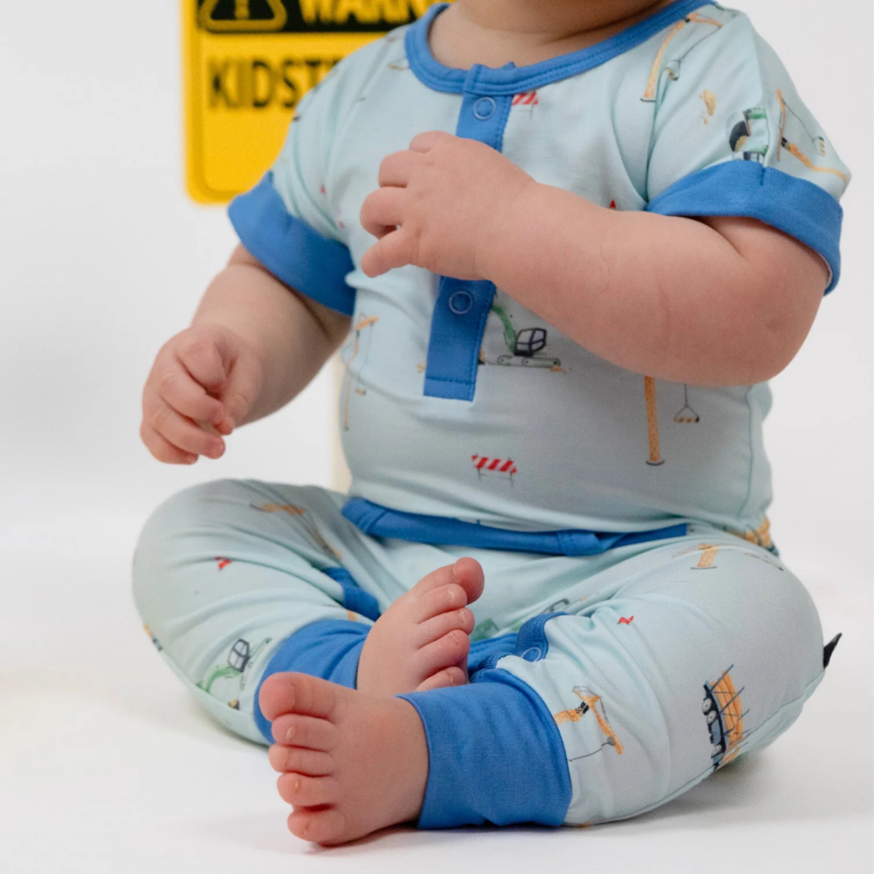 NR BELAN J S/S POCKET ROMPER | CONSTRUCTION