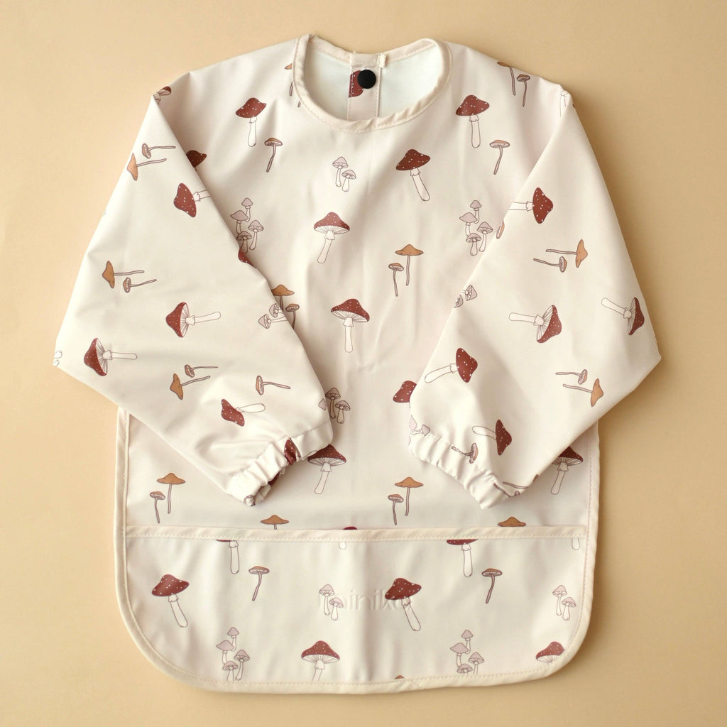 NR MINIKA LONG SLEEVE BIB | MUSHROOMS